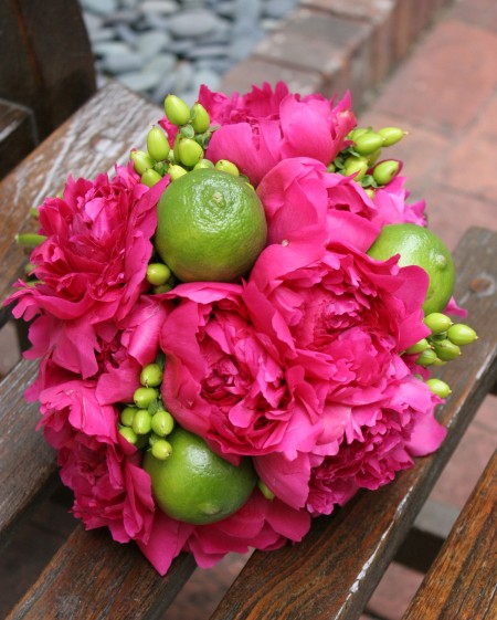 Magenta Peony with limes and green hypericum berries