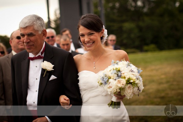 Julia walks down the aisle with her father at the Netherlanda Carillon