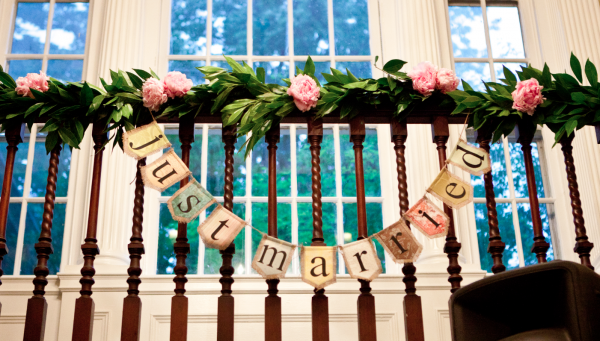 Woodend railing decor complete with greenery and peonies