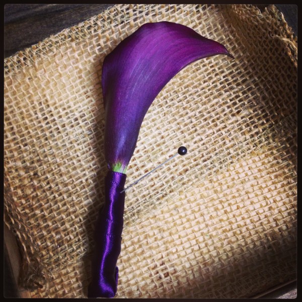 Purple mini calla lily groom's lapel boutonniere