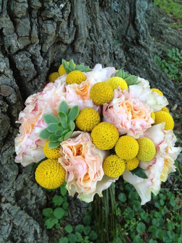 Bridesmaids bouquets with garden roses and billy balls