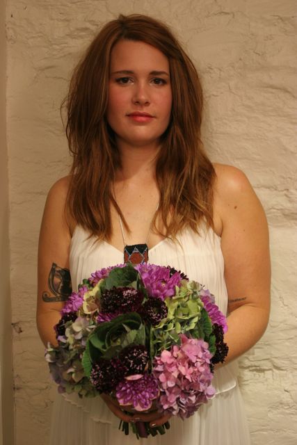 Bridal bouquet made with ornamental cabbage, hydrangea and scabiosa